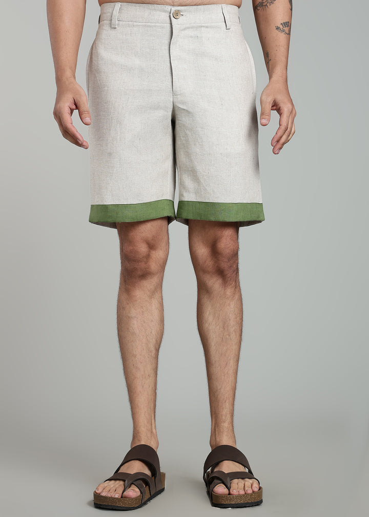 Man wearing 100% pure linen cuban-collar shirt and shorts in pure ecru with cossack-green accents in 60 LEA(shirt) & 25 LEA(shorts)