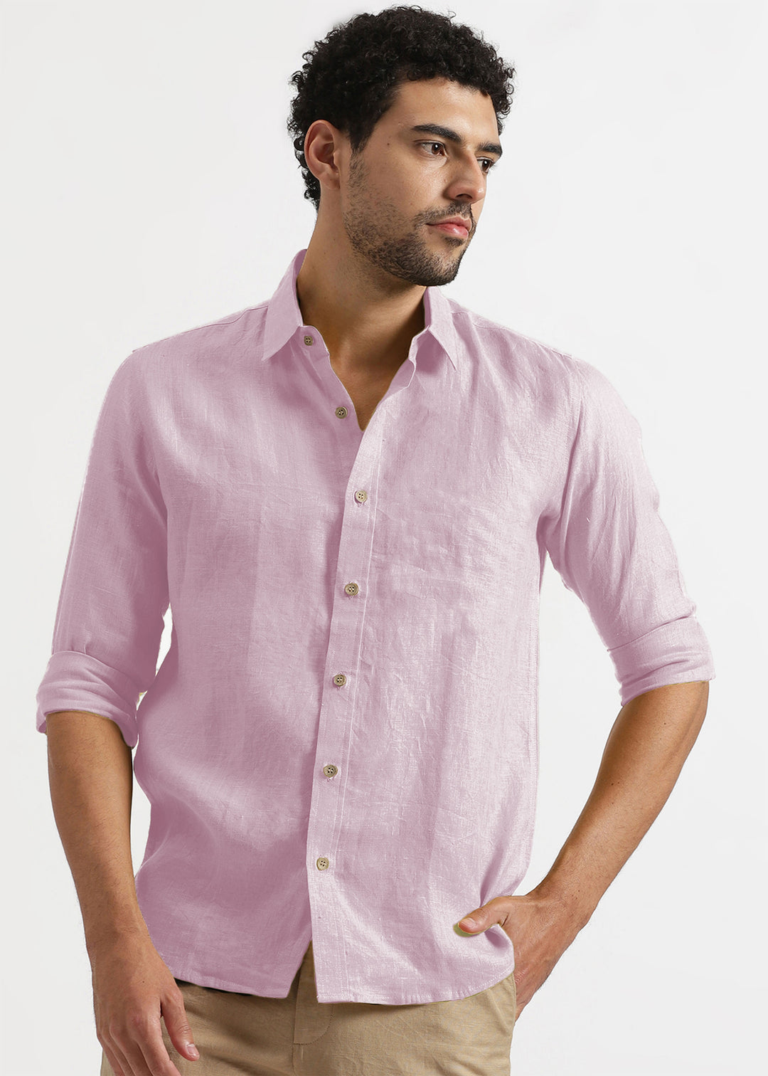 Man wearing a 100% pure linen hermosa pink shirt against a white background