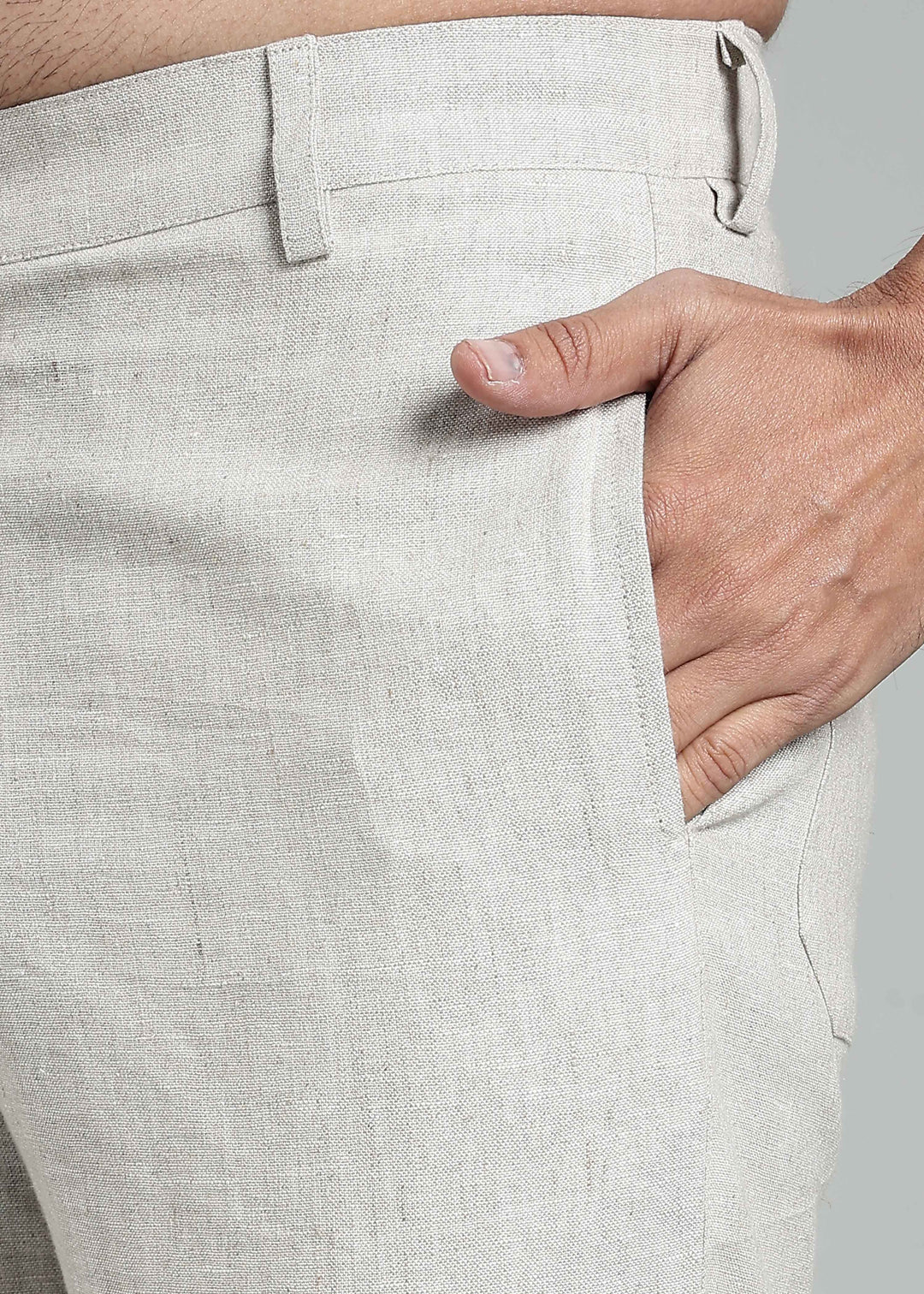 Man wearing 100% pure linen shorts in pure ecru with cossack-green accents in 25 LEA