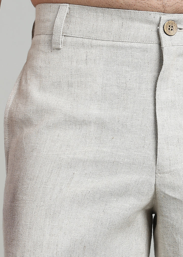 Man wearing 100% pure linen cuban-collar shirt and shorts in pure ecru with cossack-green accents in 60 LEA(shirt) & 25 LEA(shorts)