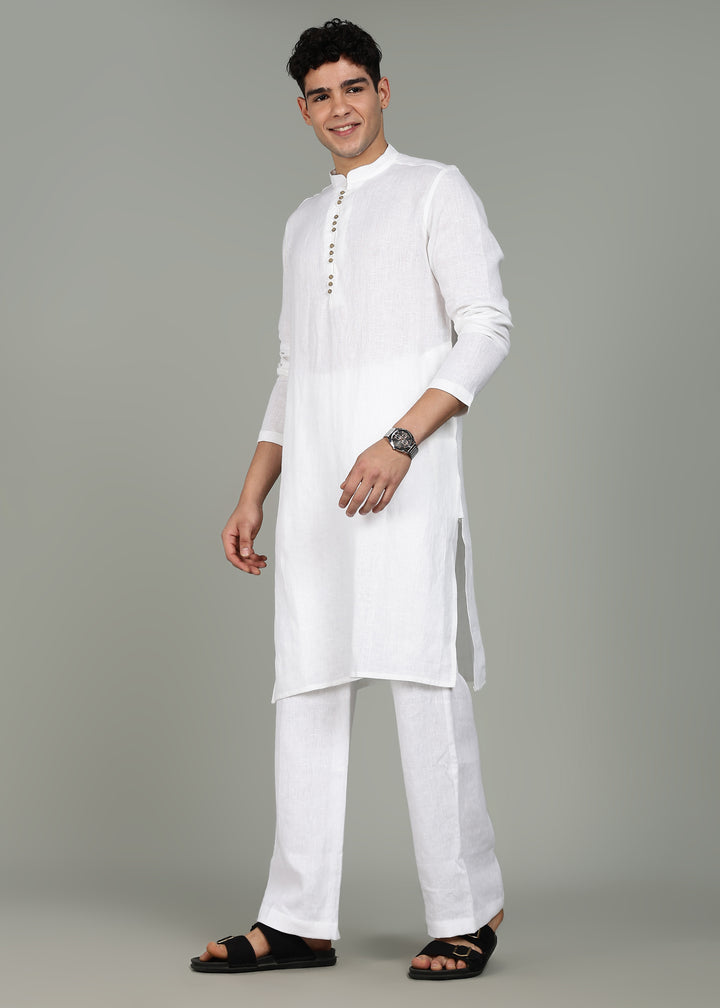 Man wearing a 100% pure linen white long kurta with pink floral design on the back in 44 LEA against a gray background