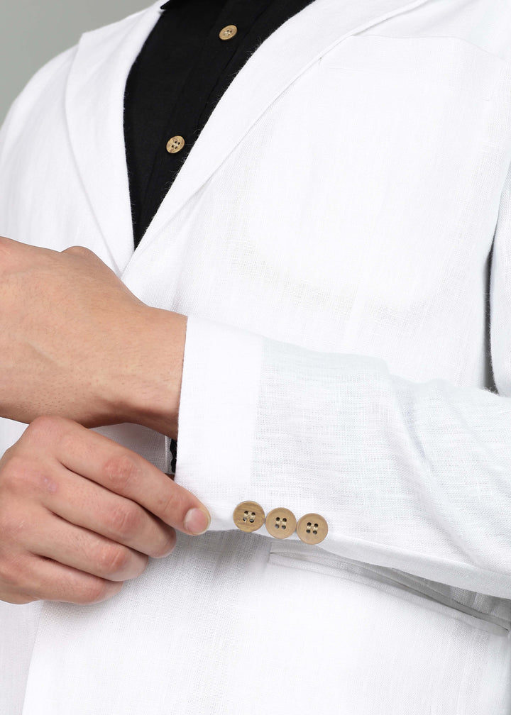Man wearing a 100% pure linen white Jacket in 25 LEA over a black shirt on a gray background