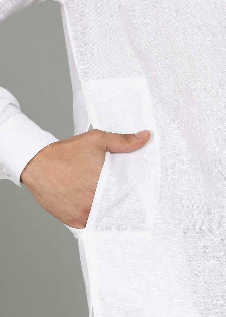 Man wearing a 100% pure linen white long kurta in 44 LEA with a gray background