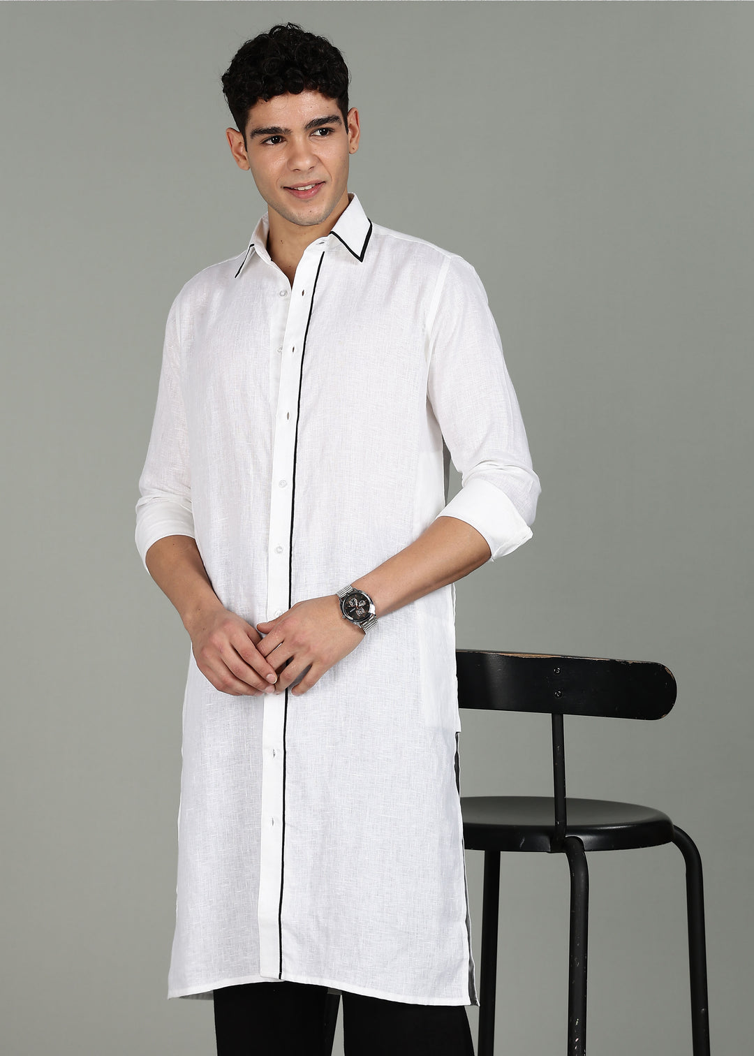 Man wearing a 100% pure linen white long kurta in 44 LEA with a gray background