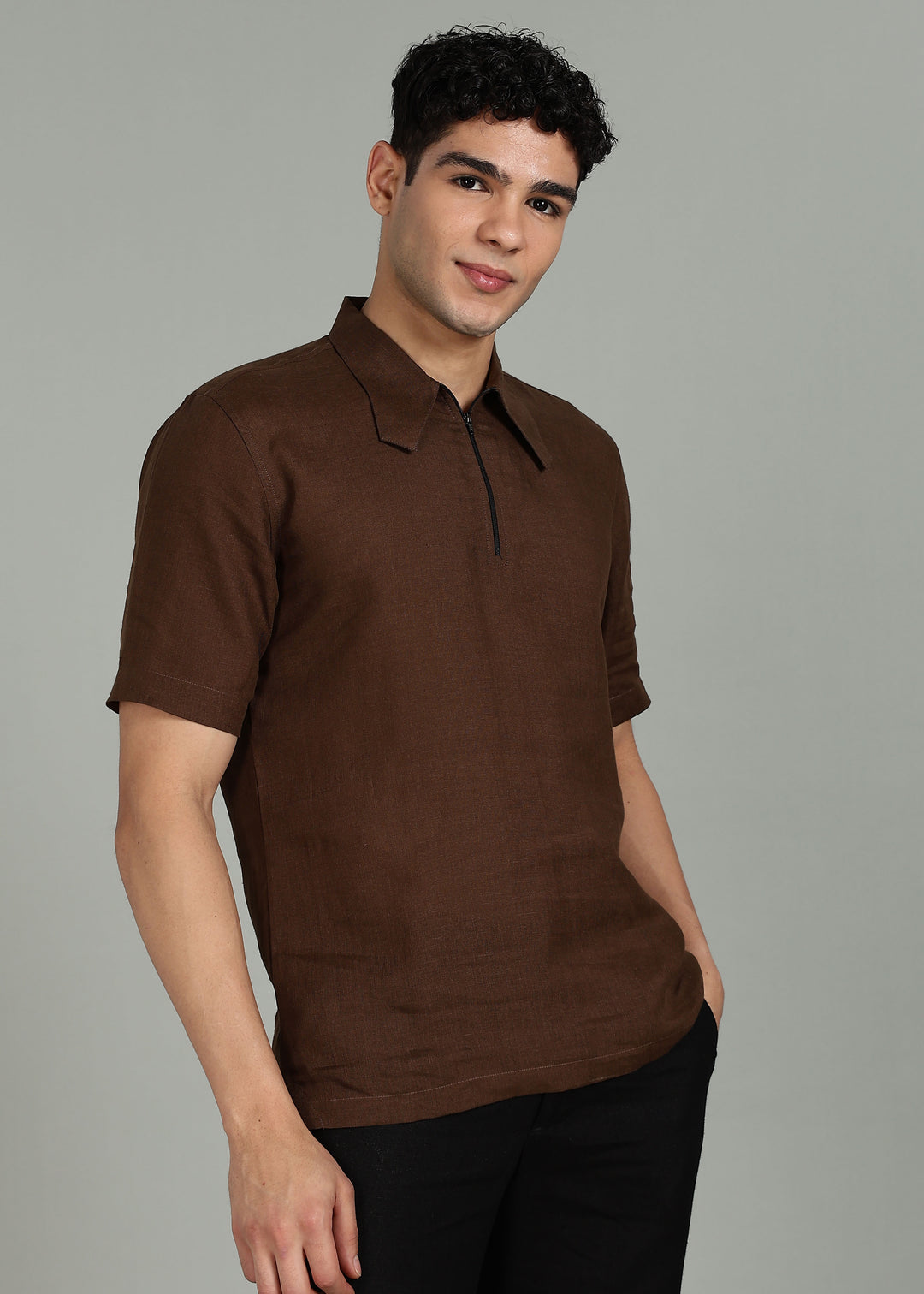 Man wearing 100% 60 LEA Linen Coffee brown T - Shirt in an indoor grey background.