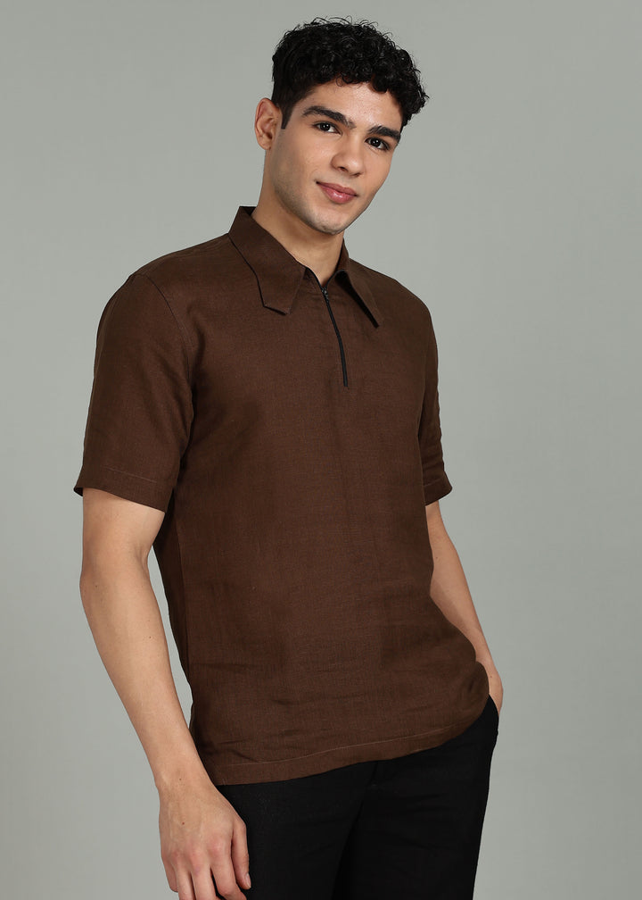 Man wearing 100% 60 LEA Linen Coffee brown T - Shirt in an indoor grey background.