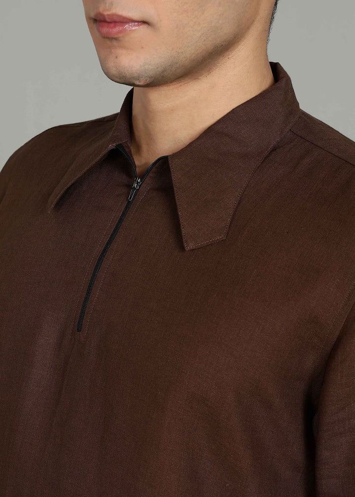 Man wearing 100% 60 LEA Linen Coffee brown T - Shirt in an indoor grey background.