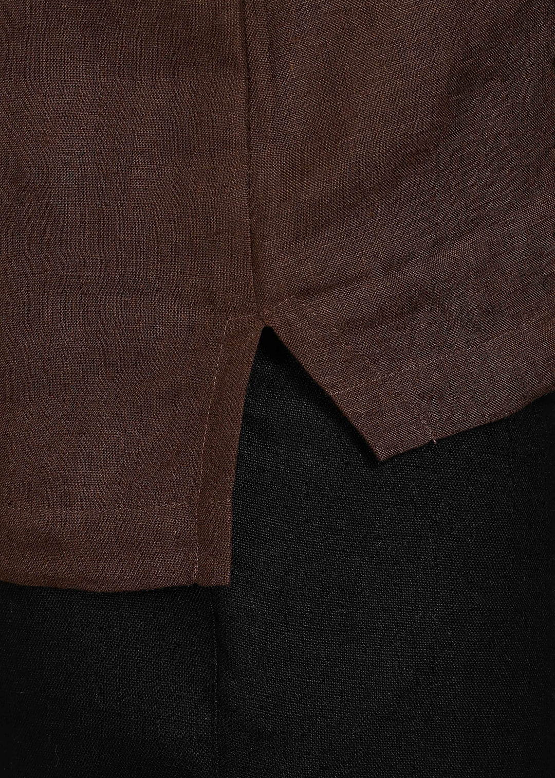 Man wearing 100% 60 LEA Linen Coffee brown T - Shirt in an indoor grey background.