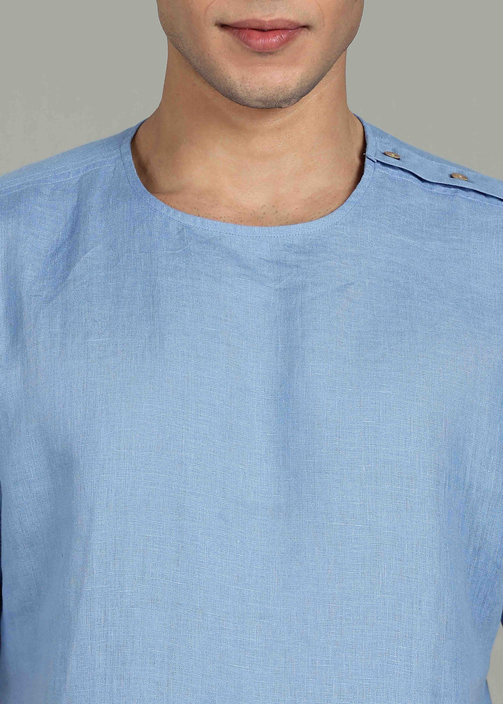 Man wearing 100% 60 LEA Olympic Blue Mandarin collar  T - Shirt in an indoor grey background.