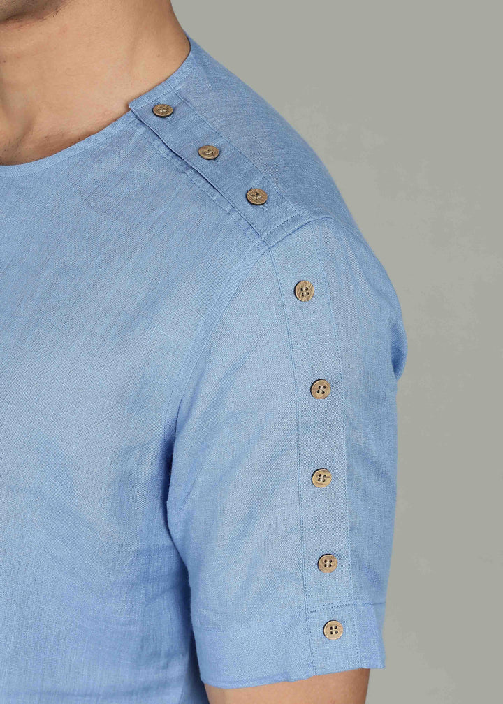 Man wearing 100% 60 LEA Olympic Blue Mandarin collar  T - Shirt in an indoor grey background.