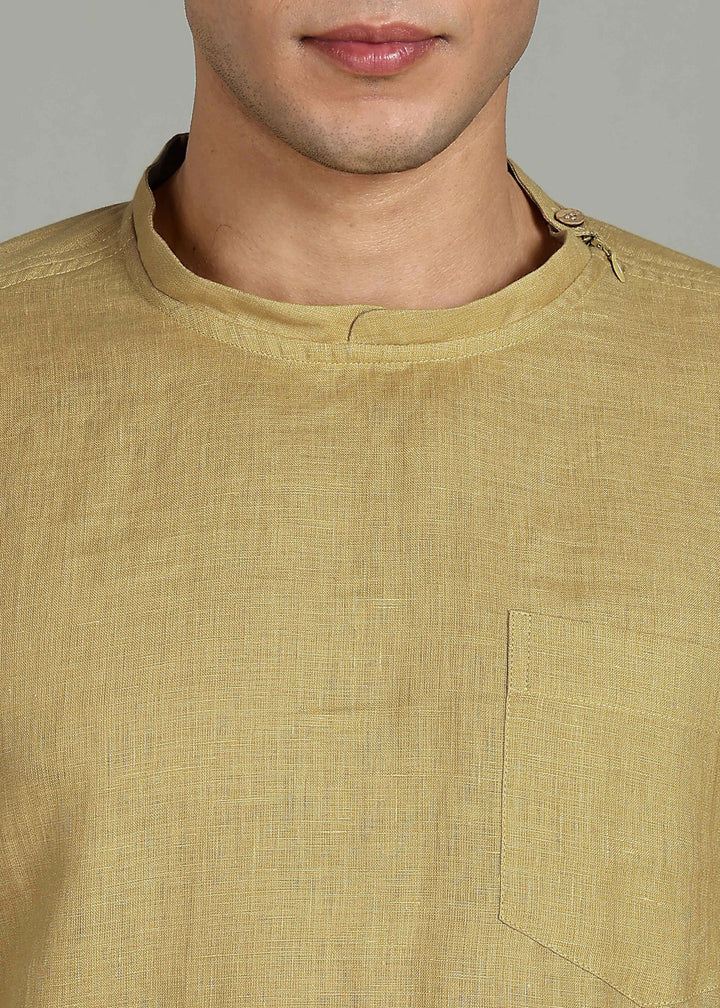 Man wearing 100% 60 LEA Sun Burst Yellow Mandarin collar  T - Shirt in an indoor grey background.