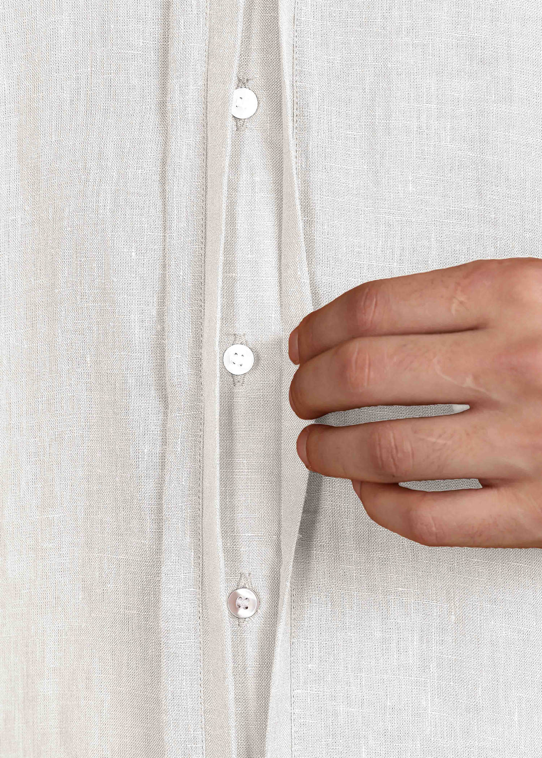 100% pure linen white full sleeve shirt in 44 LEA with buttons and a hand adjusting it against a white background