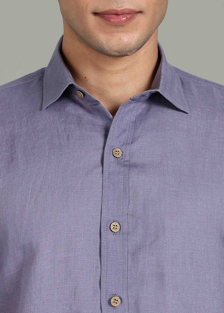 Man wearing 100% 60 LEA Lavender Violet Half sleeve Shirt in an indoor grey background.