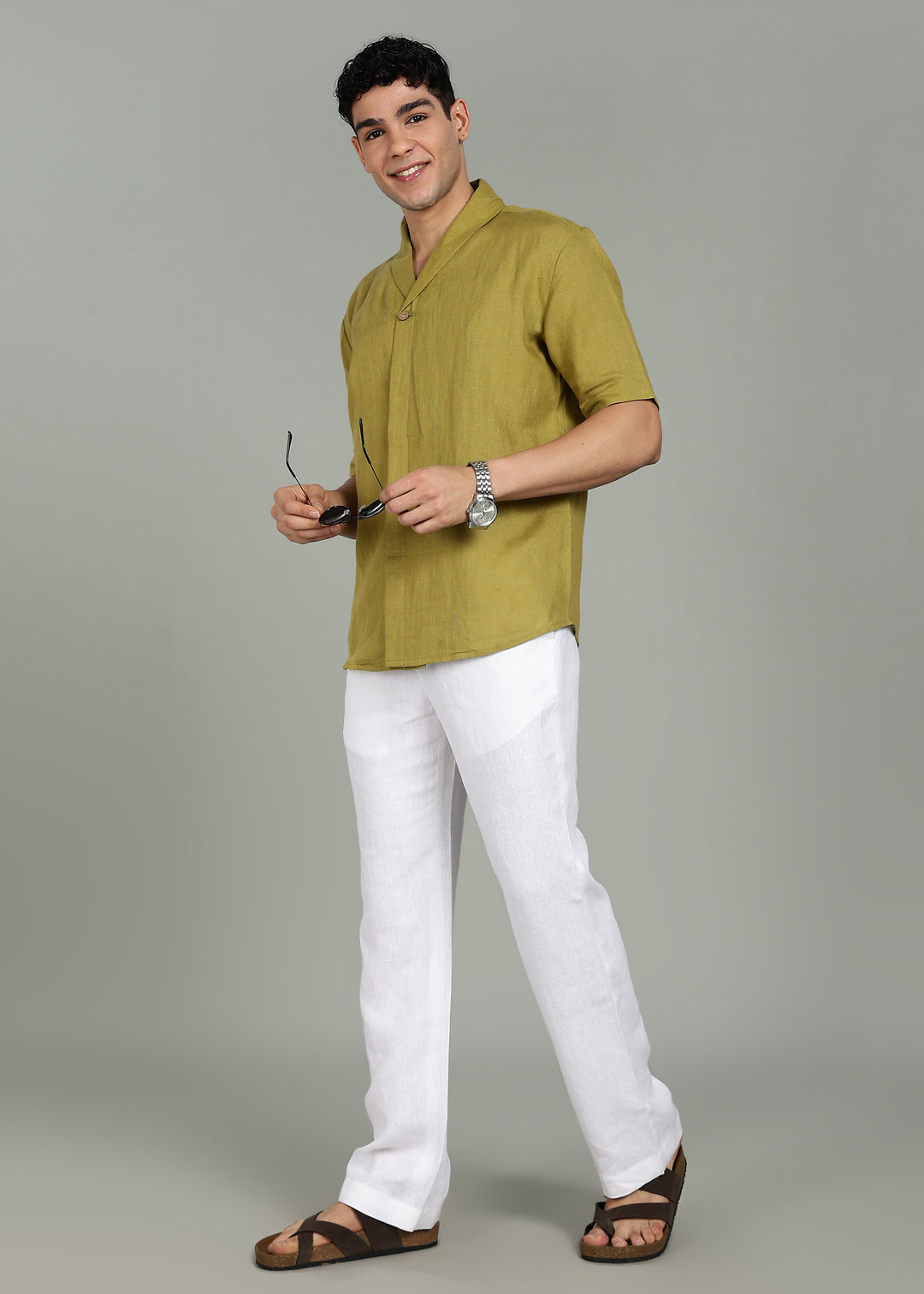 Man wearing 100% 60 LEA Sap Green Shawl collar Half sleeve Shirt in an indoor grey background.