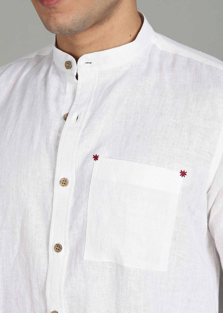 100% pure linen white full sleeve shirt in 44 LEA with red floral embroidery on a gray background