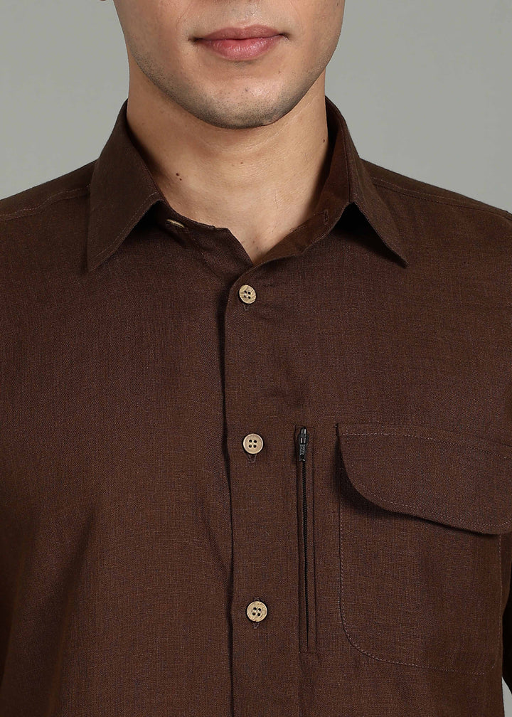 Man wearing 100% 60 LEA Coffee Brown Half sleeve Shirt in an indoor grey background.