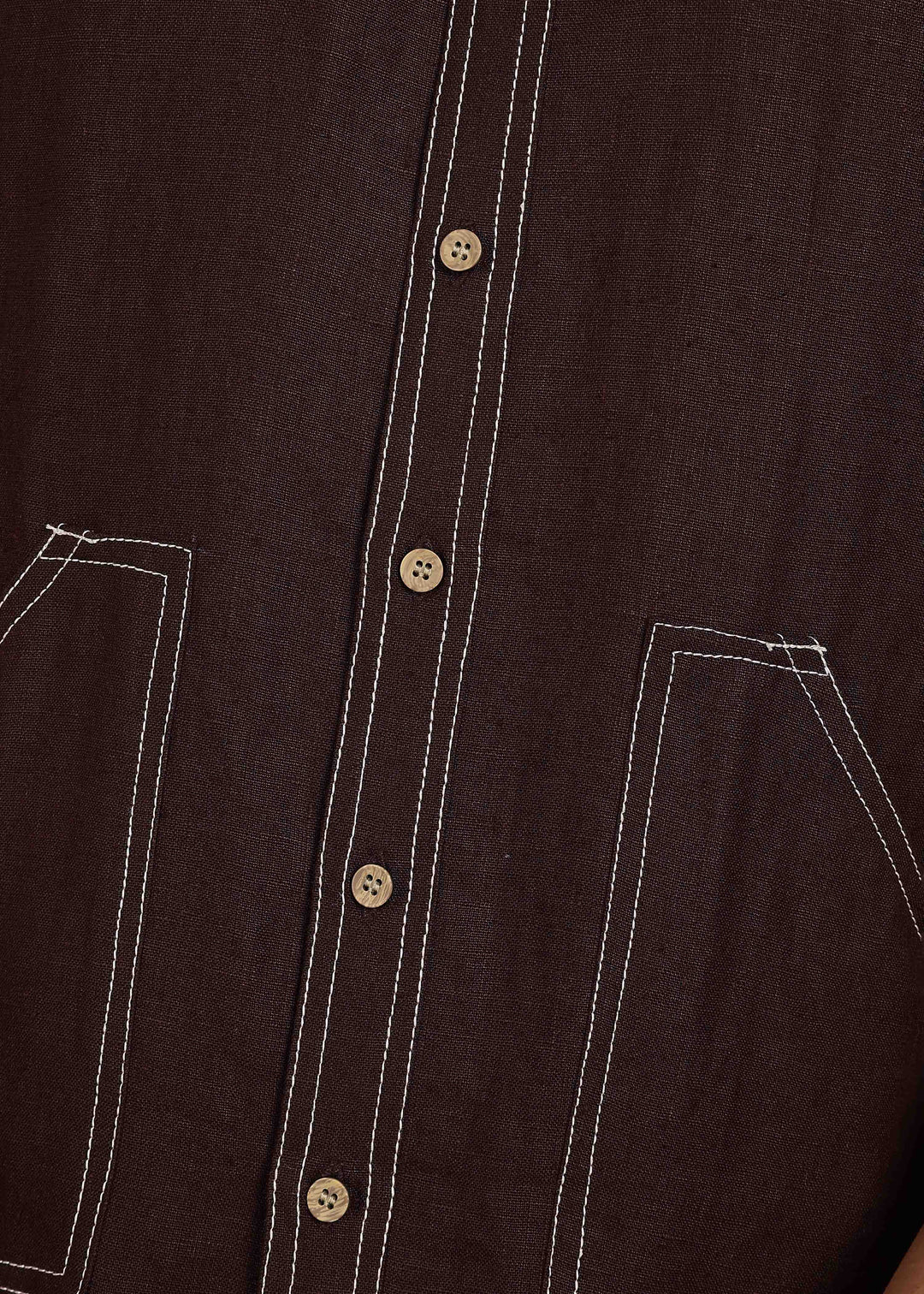 Man wearing 100% 25 LEA Cocoa Brown Half sleeve Shirt in an indoor grey background.