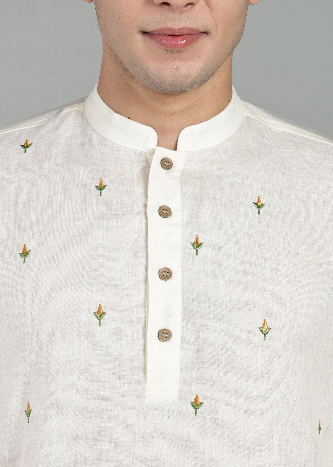 Kathir - Full Sleeve Mandarin Collar Pure Linen Embroidered Mid Kurta - Yellow on Creme White