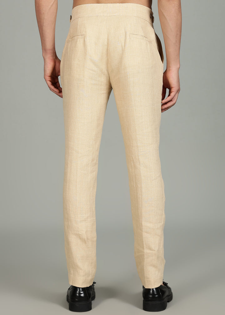 Man wearing 100% 25 LEA Capuccino Beige formal pants in an indoor grey background.