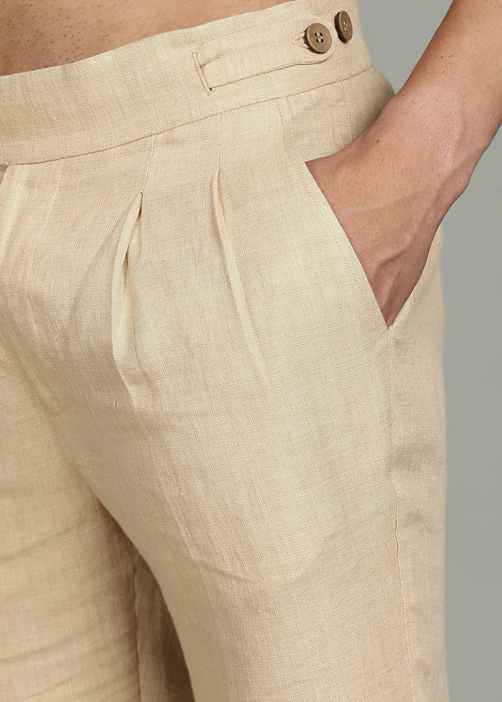 Man wearing 100% 25 LEA Capuccino Beige formal pants in an indoor grey background.