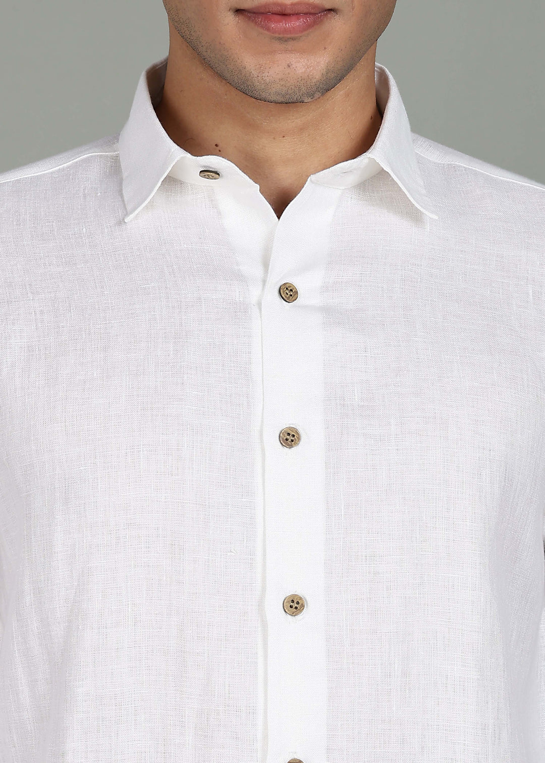 Man wearing a 100% pure linen White full sleeve shirt in 60 LEA against a gray background