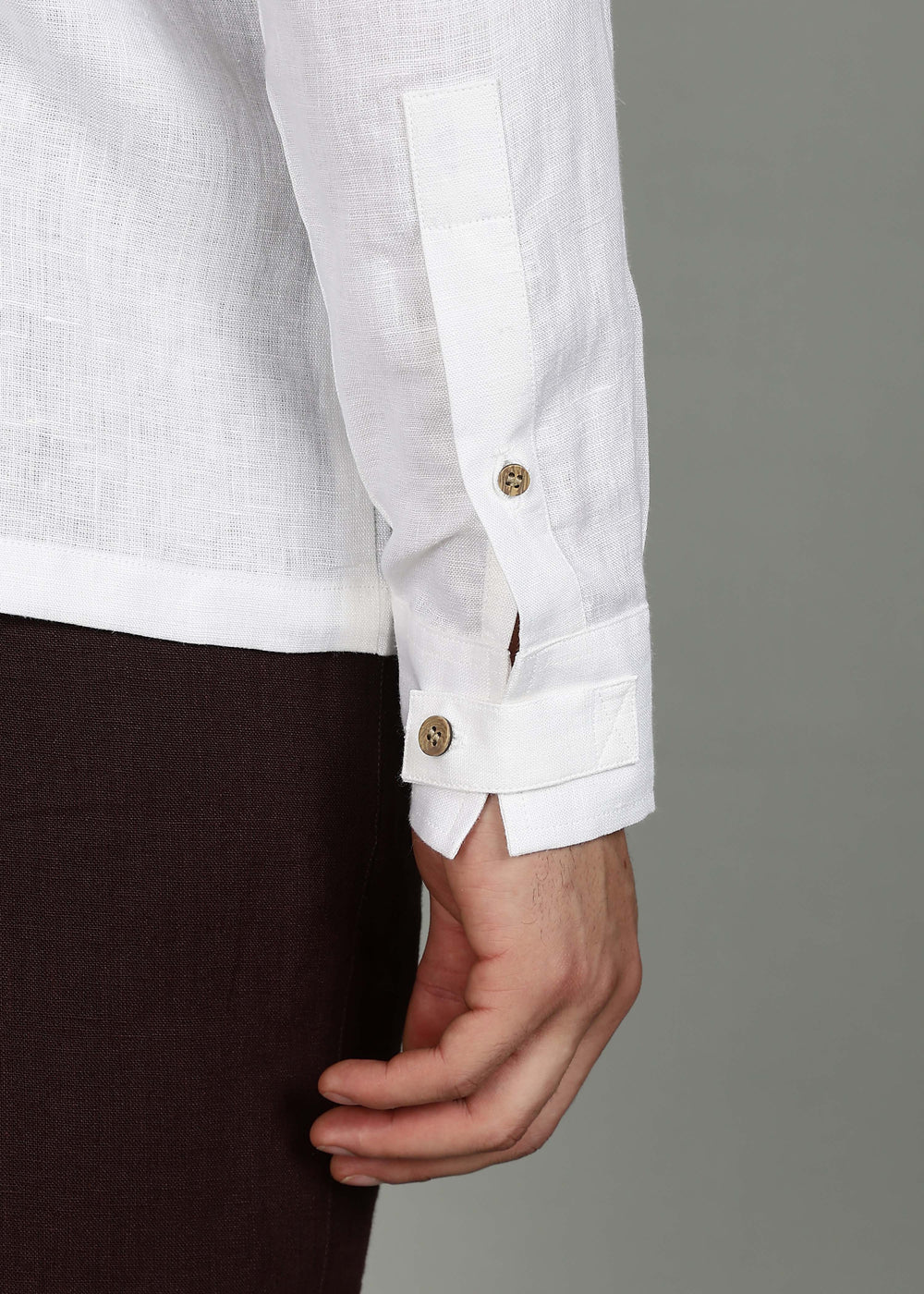 Man wearing a 100% pure linen White full sleeve shirt in 60 LEA against a gray background