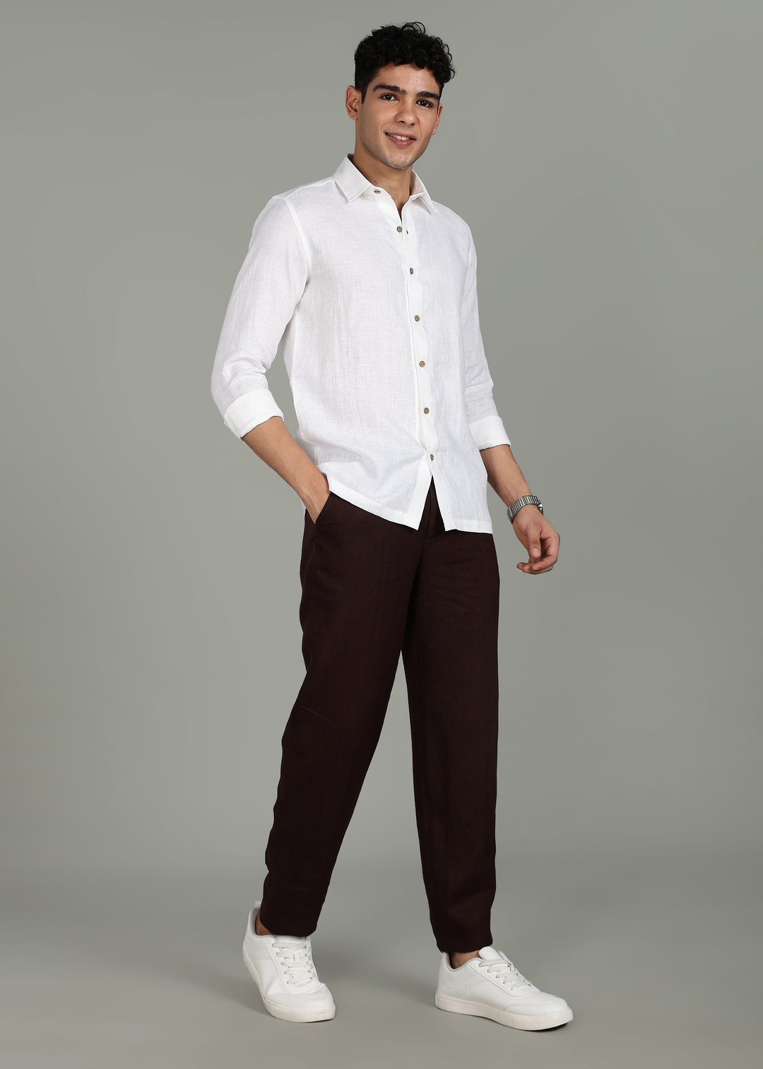 Man wearing a 100% pure linen White full sleeve shirt in 60 LEA against a gray background