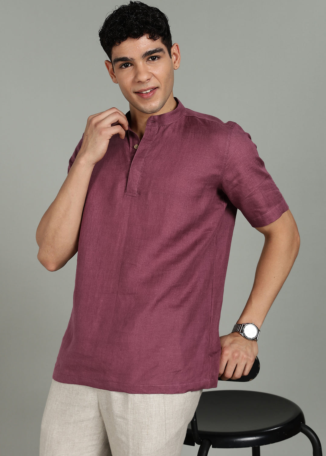 Man wearing 100% 60 LEA Twilight Purple  Half sleeve Shirt in an indoor grey background.