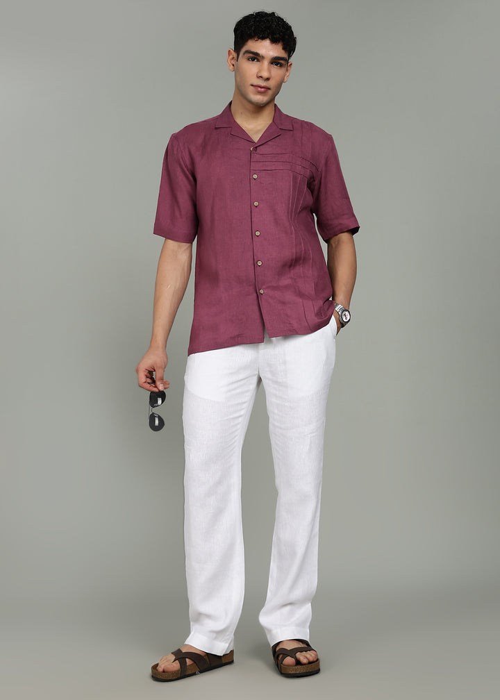 Man wearing 100% 60 LEA Twilight Purple Cuban collar Half sleeve Shirt in an indoor grey background.
