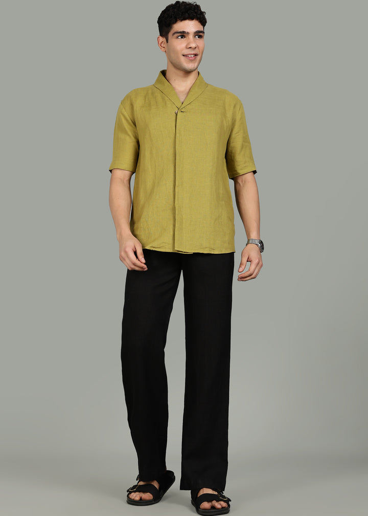 100% pure linen black pants in 25 LEA worn by a person on a gray background