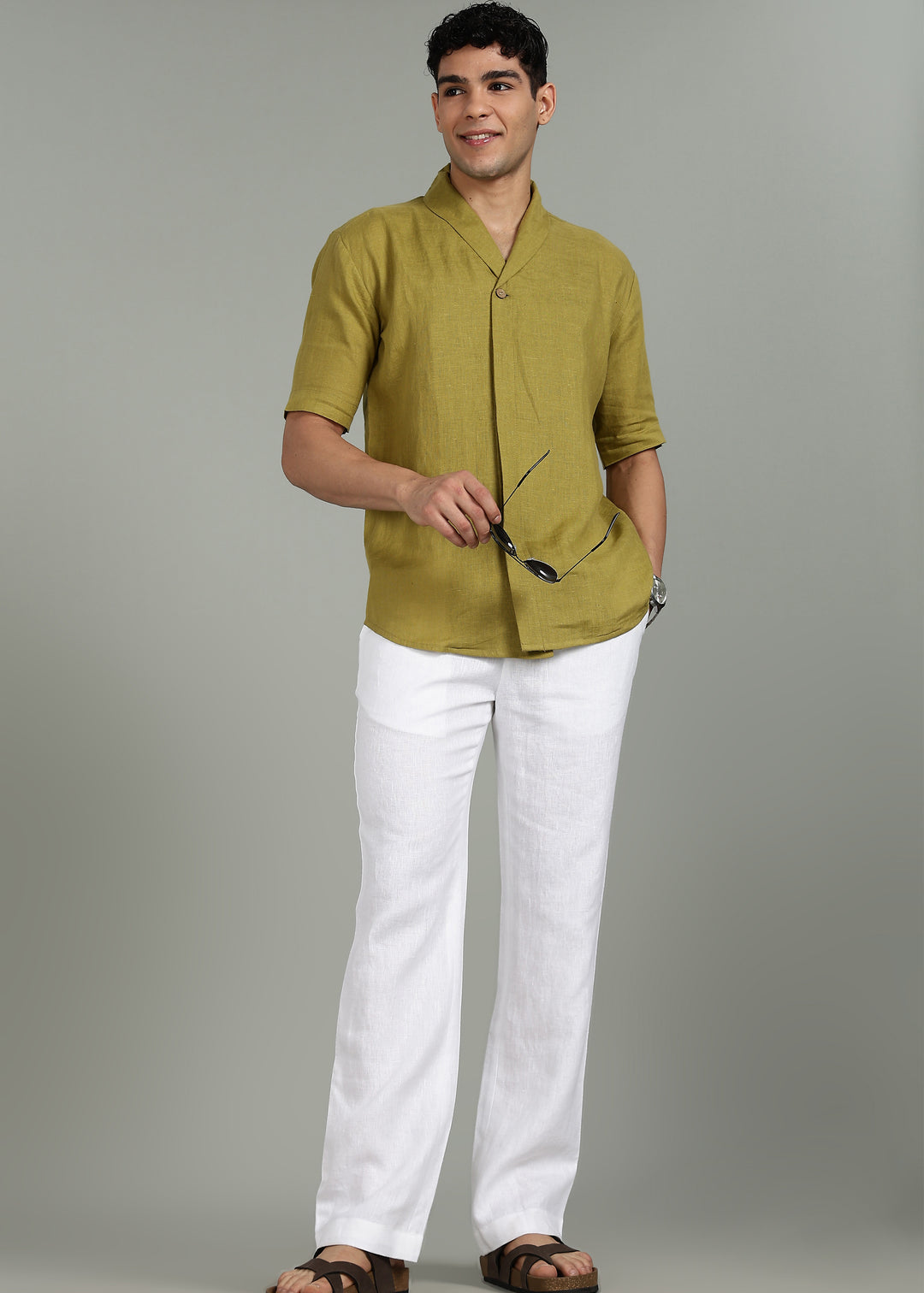 100% pure linen white pants in 25 LEA worn by a person on a gray background