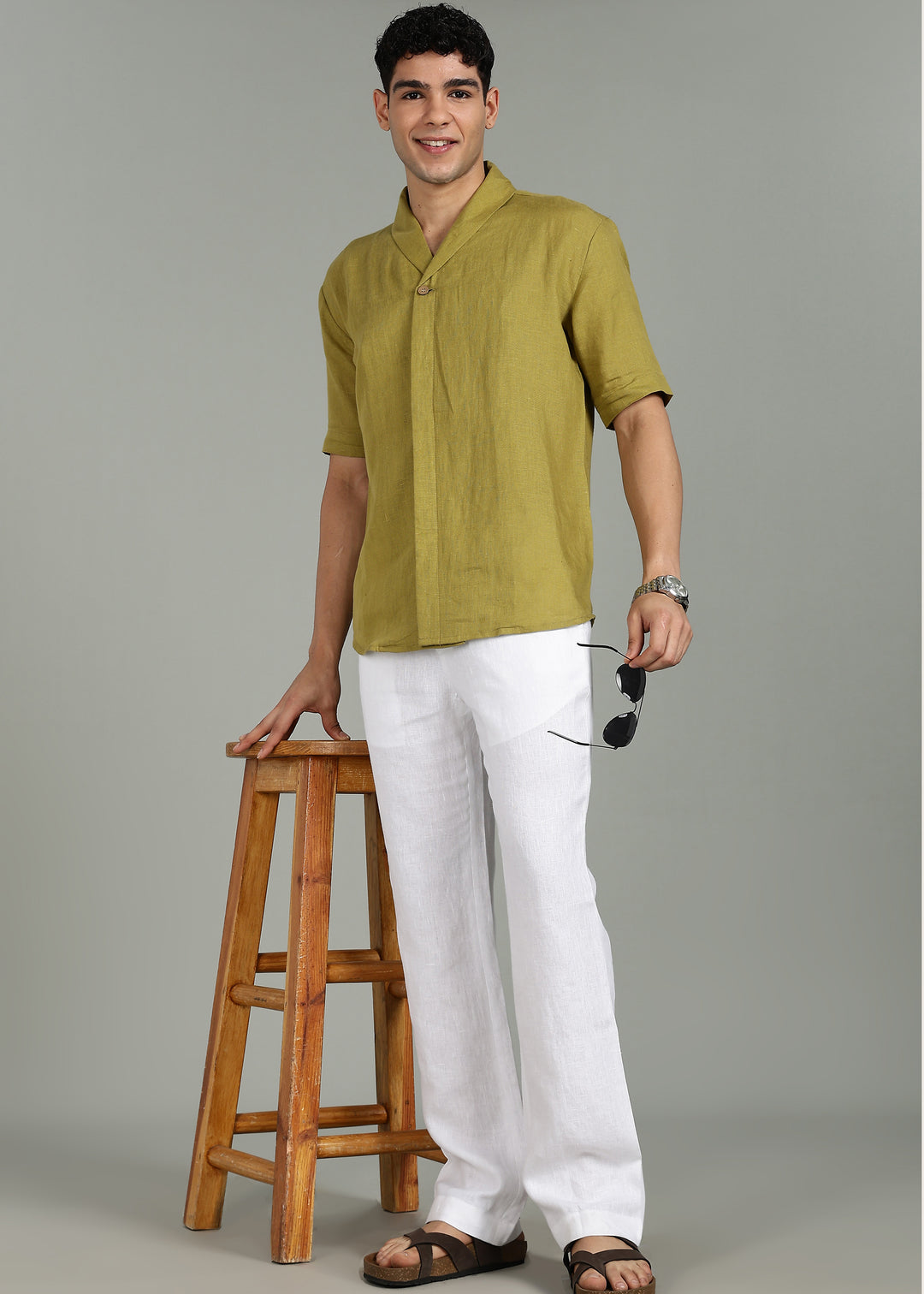 100% pure linen white pants in 25 LEA worn by a person on a gray background