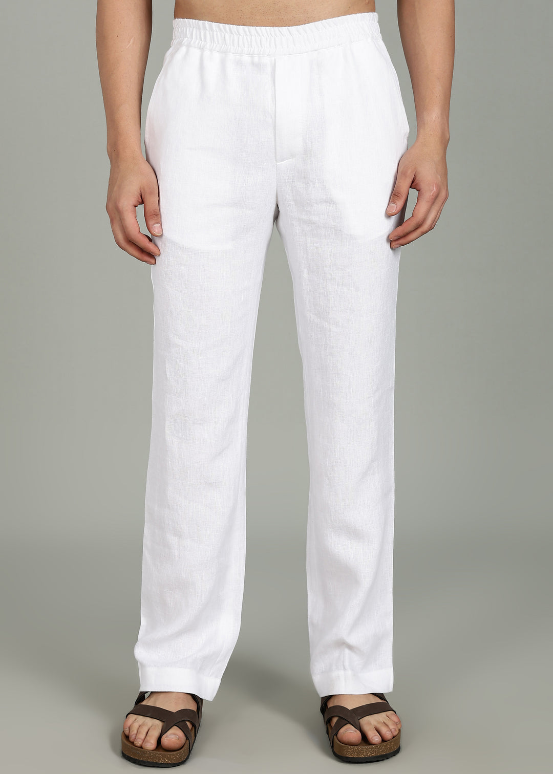 100% pure linen white pants in 25 LEA worn by a person on a gray background