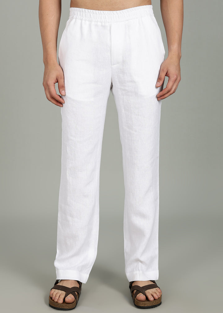 100% pure linen white pants in 25 LEA worn by a person on a gray background