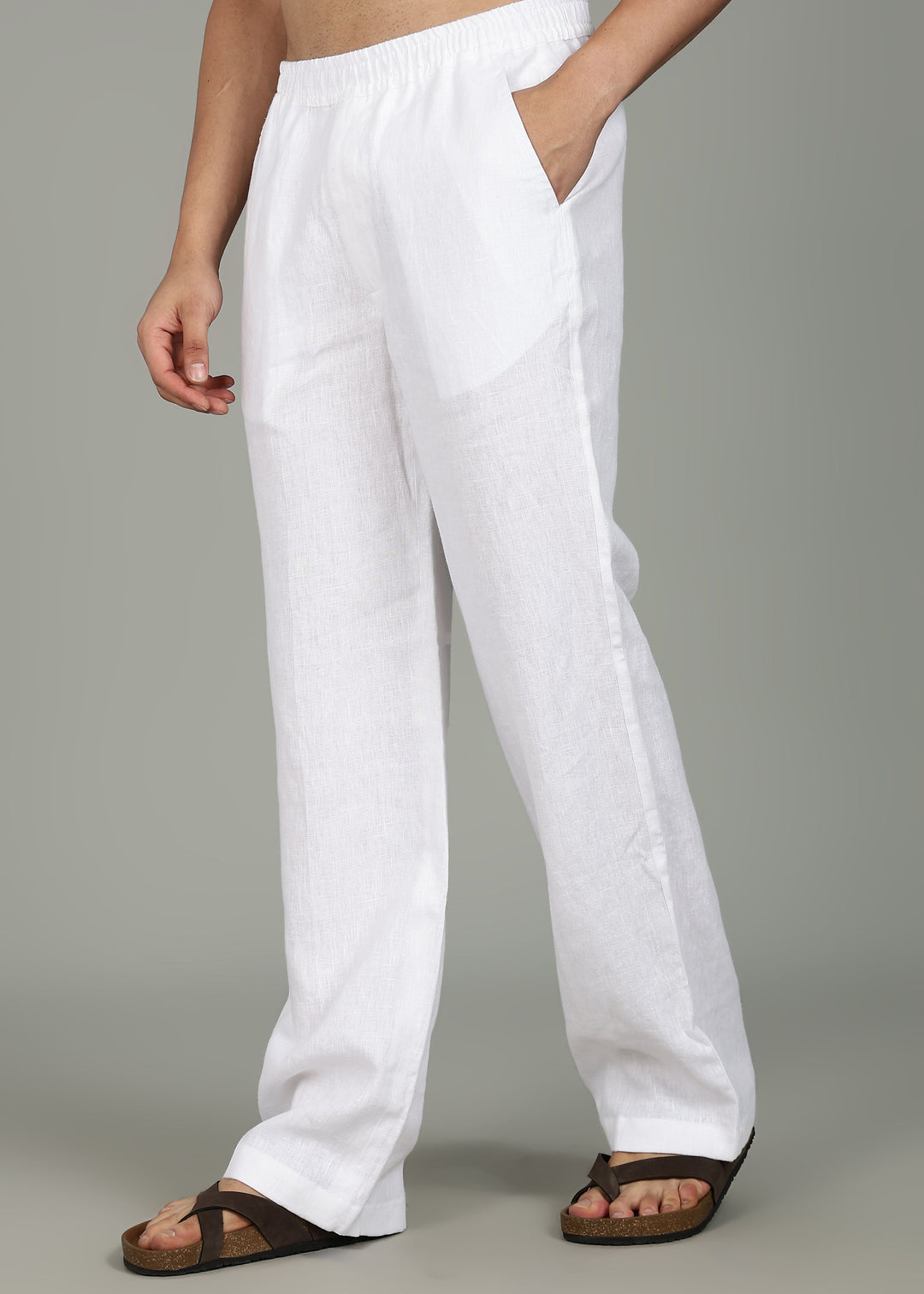 100% pure linen white pants in 25 LEA worn by a person on a gray background