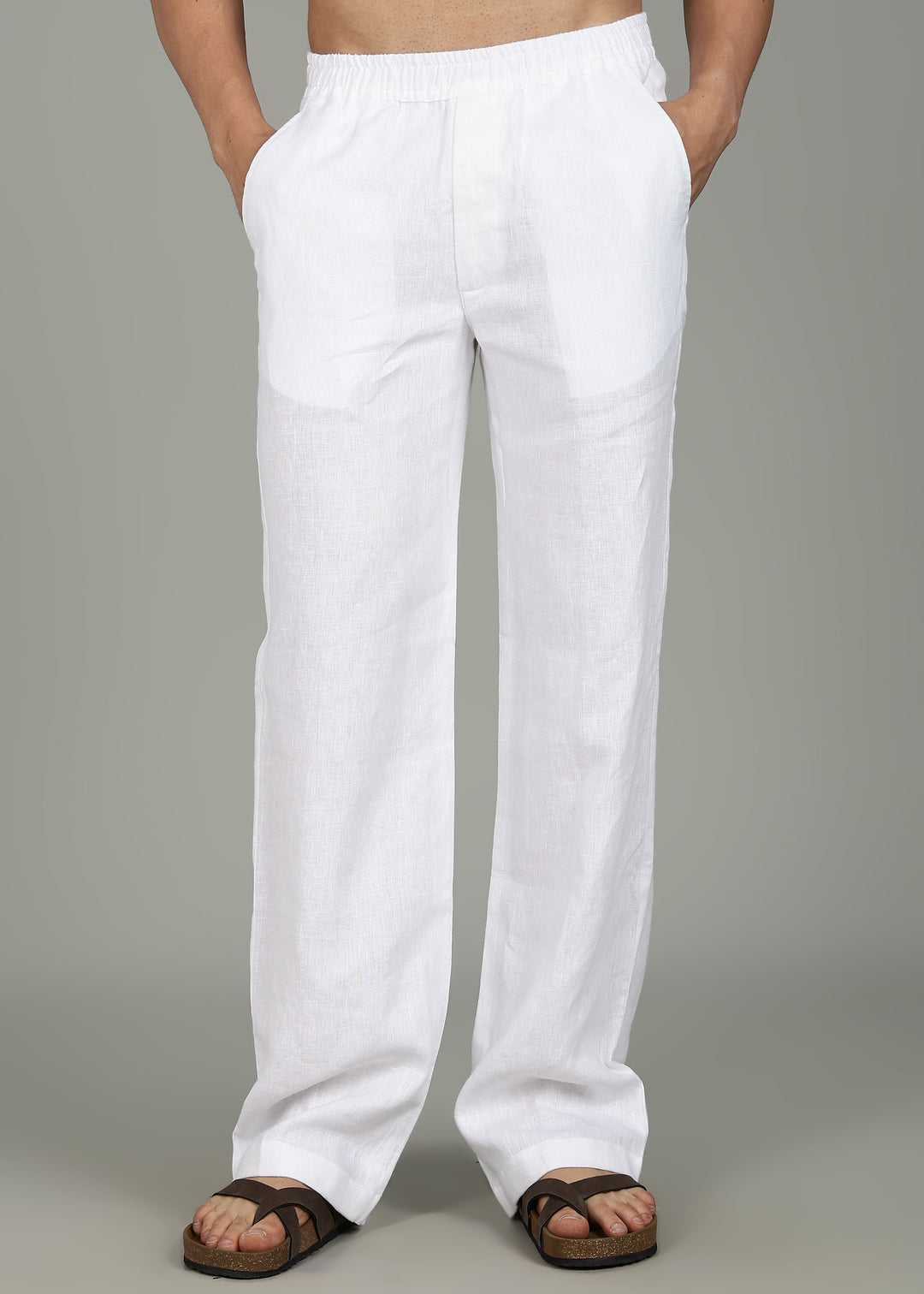 100% pure linen white pants in 25 LEA worn by a person on a gray background